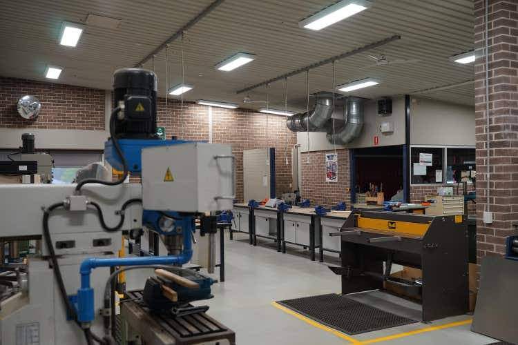 A large room with assorted metal machines and equipment.